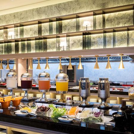 לודונג Cuncyue Hot Spring Resort מראה חיצוני תמונה The buffet at the hotel