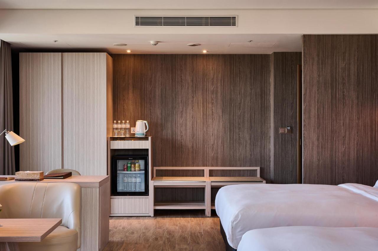 לודונג Cuncyue Hot Spring Resort מראה חיצוני תמונה A room at the hotel