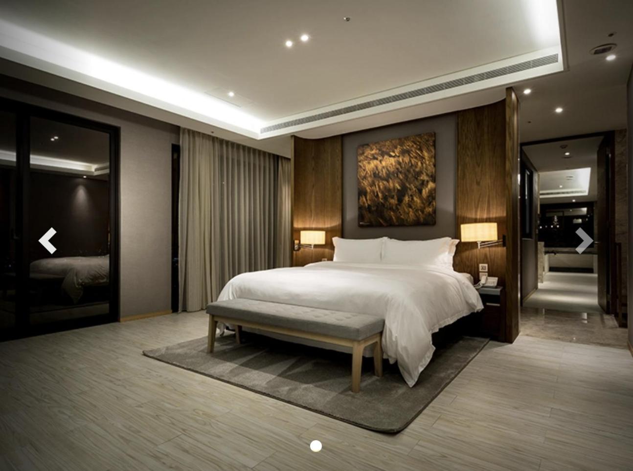לודונג Cuncyue Hot Spring Resort חדר תמונה A bedroom at the Ritz-Carlton, Maldives
