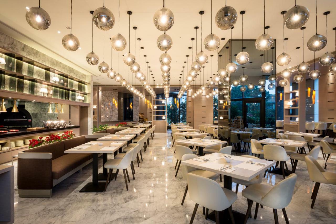 לודונג Cuncyue Hot Spring Resort מראה חיצוני תמונה The interior of the restaurant